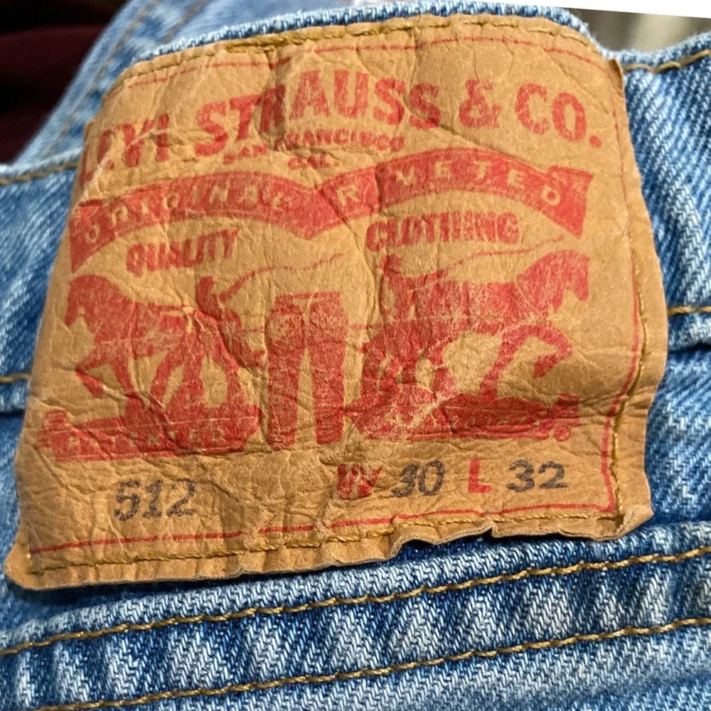 Levi's 512 Slim Fit Distressed Tapered Light Wash Jeans - Picture 12 of 16